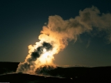 Old Faithful Geyser at Sunset, Yellowstone National Park, Wyoming